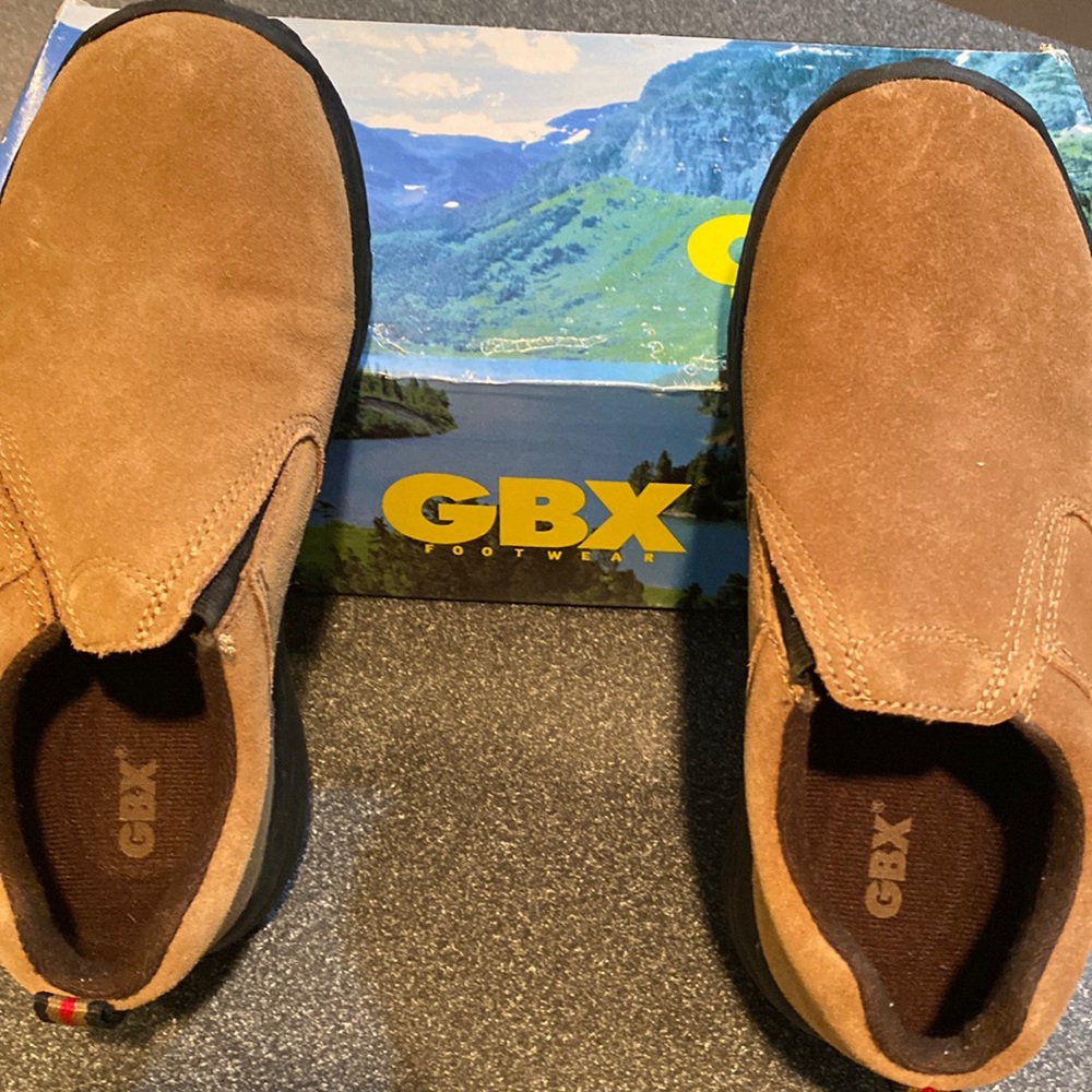 Never worn GBX slip on shoes